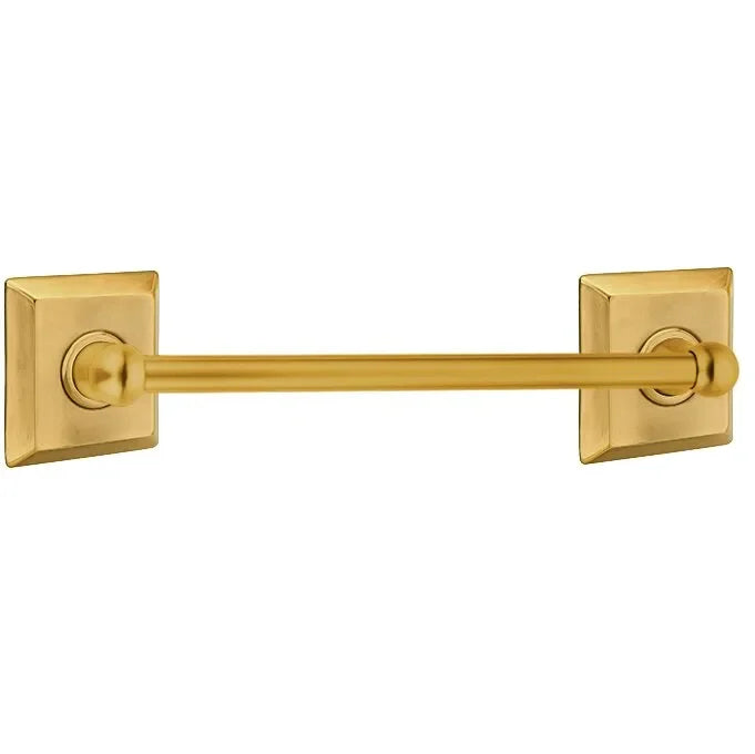 The Emtek Traditional Brass Towel Bar with Quincy Rosette in French Antique finish.