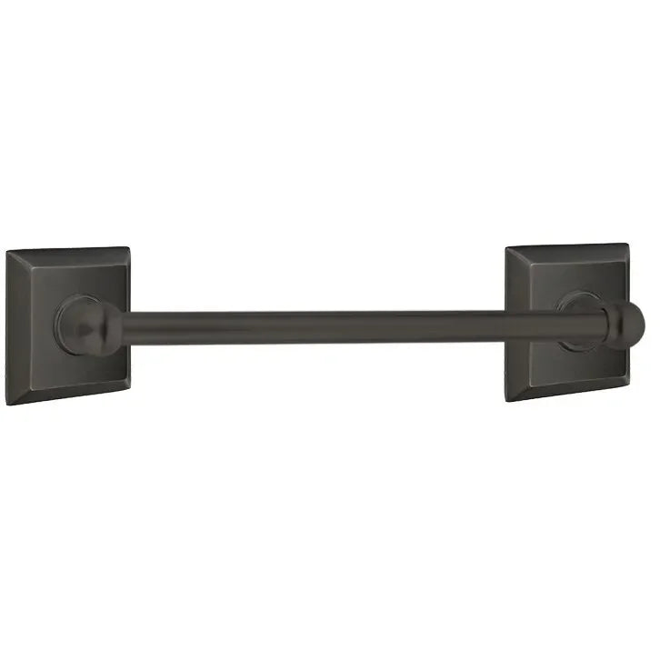The Emtek Traditional Brass Towel Bar with Quincy Rosette in Oil Rubbed Bronze finish.