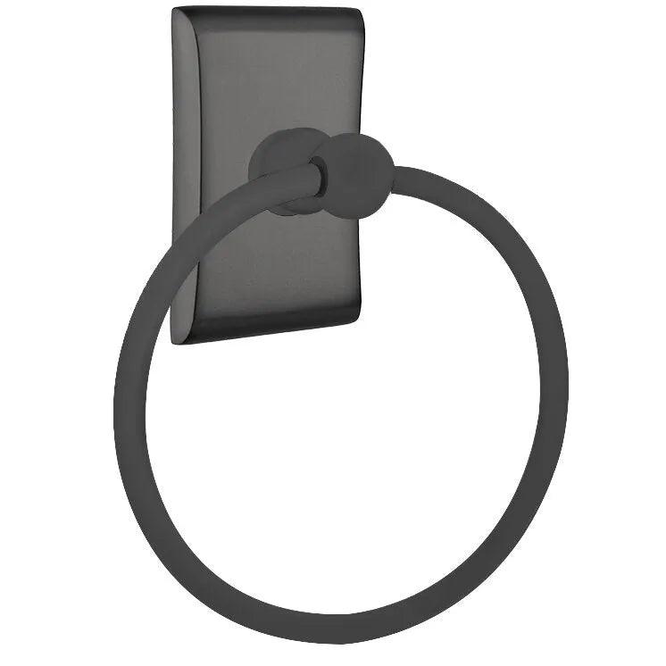 The Emtek Traditional Brass Towel Ring with Neos Rosette in Flat Black finish.