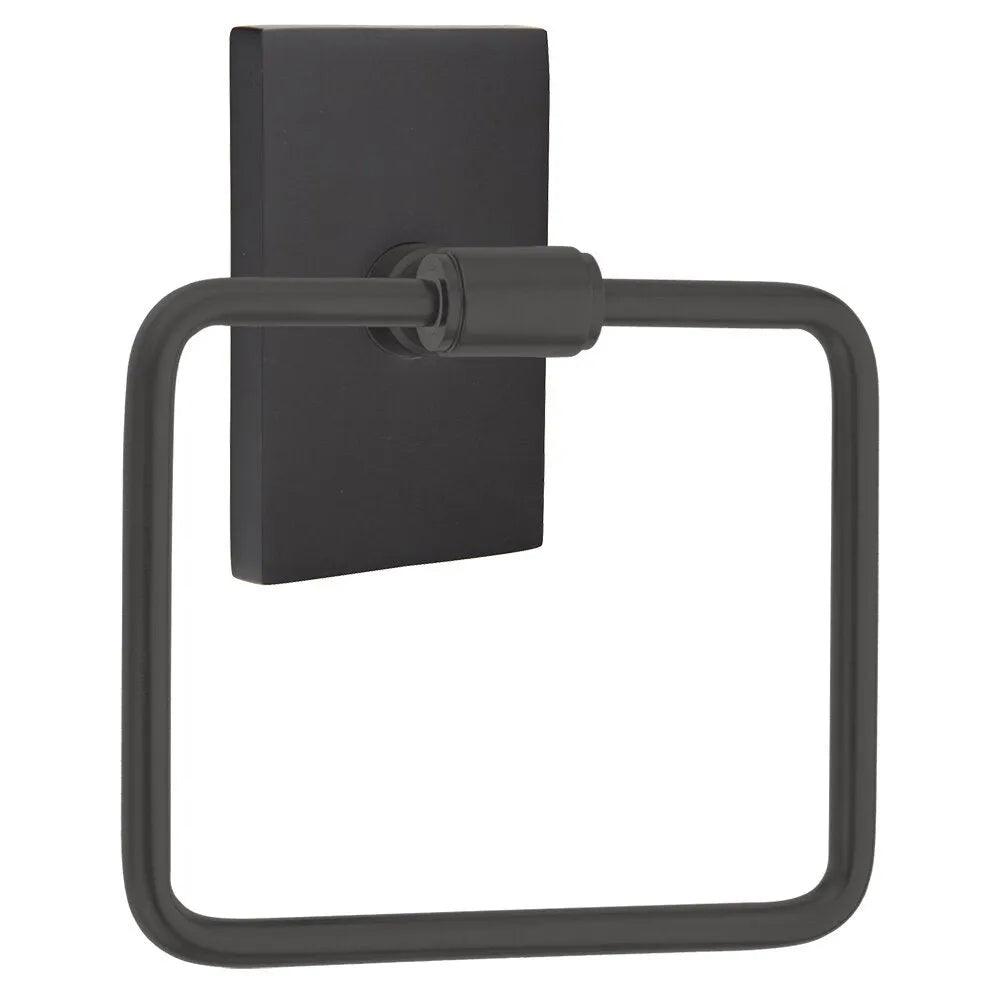 The Emtek Transitional Brass Towel Ring with Modern Rectangular Rosette in Flat Black finish.