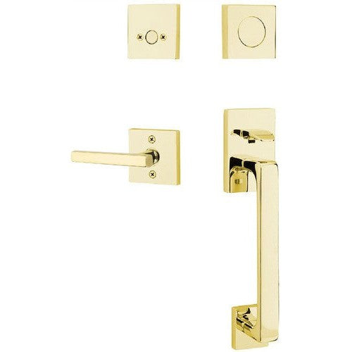 Emtek Baden Entrance Handleset With Freestone Lever in Unlacquered Brass finish