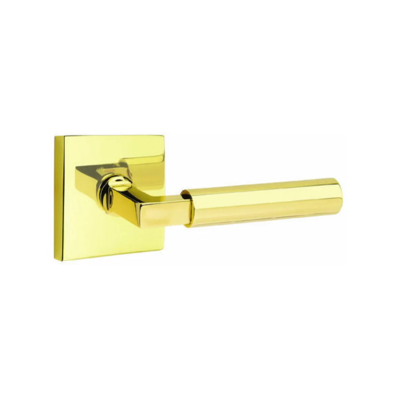 The Emtek Hercules Lever With Square Rosette in Unlacquered Brass finish