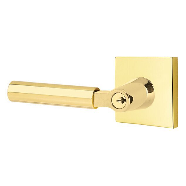 The Emtek Hercules Lever With Square Rosette in Unlacquered Brass finish