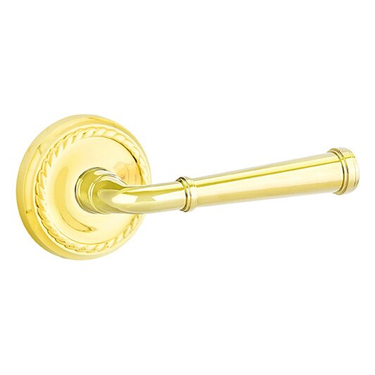 The Emtek Merrimack Lever With Rope Rosette in Unlacquered Brass finish