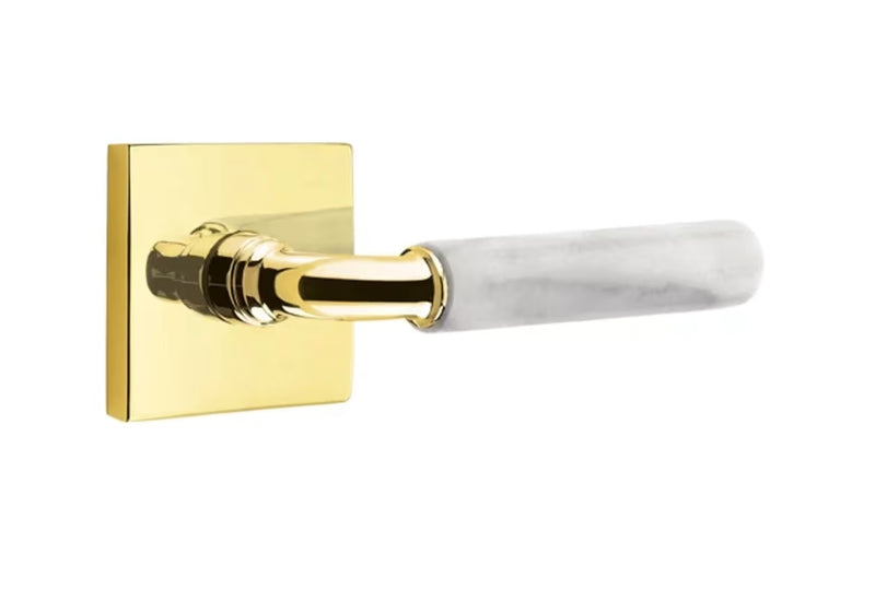 The Emtek Select R-Bar White Marble Lever with Square Rosette in Unlacquered Brass finish.