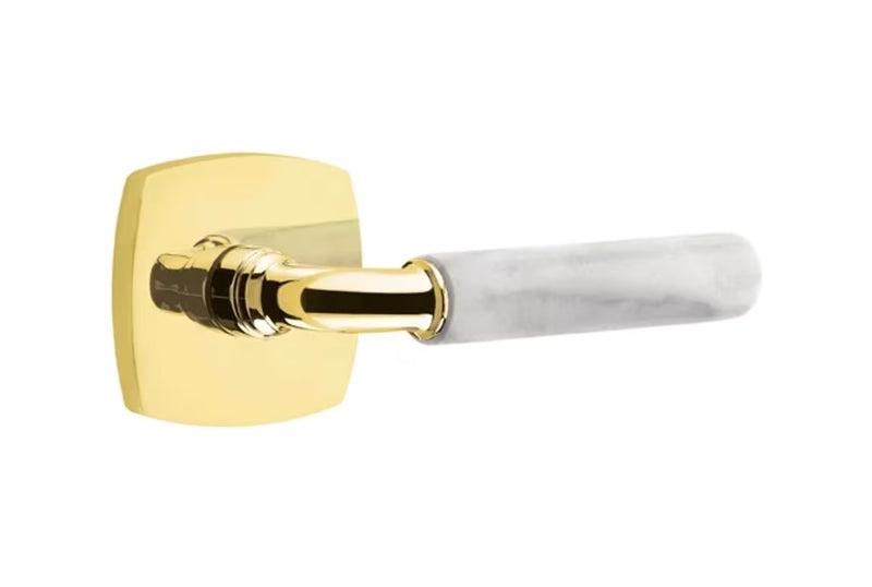 The Emtek Select R-Bar White Marble Lever with Urban Modern Rosette in Unlacquered Brass finish.