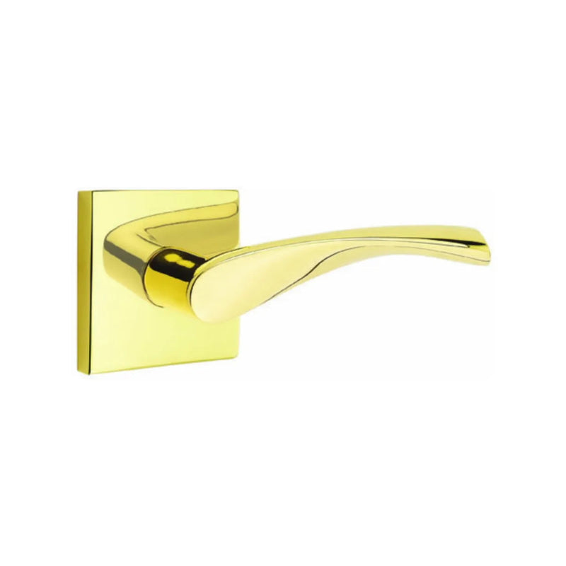 The Emtek Triton Lever With Square Rosette in Unlacquered Brass finish