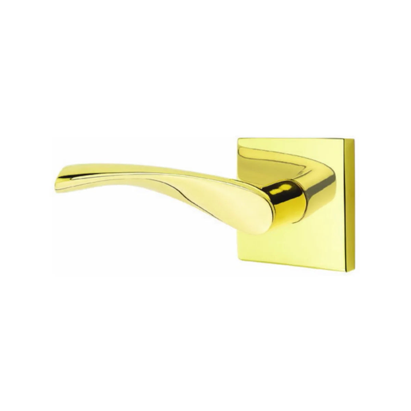 The Emtek Triton Lever With Square Rosette in Unlacquered Brass finish