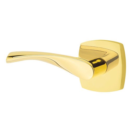 The Emtek Triton Lever With Urban Modern Rosette in Unlacquered Brass finish