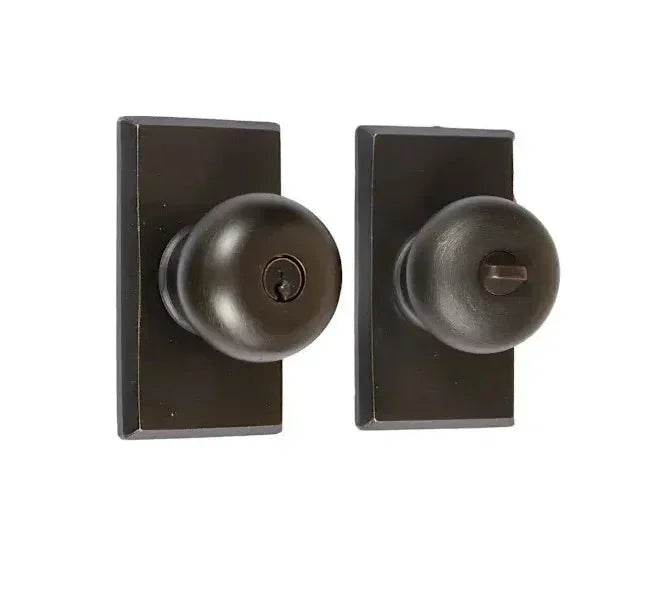 The Emtek Winchester Knob with #3 Rosette in Medium Bronze Patina finish.