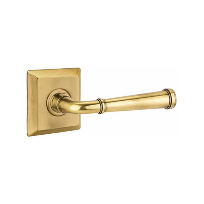 The Emtek Merrimack Lever with Quincy Rosette in French Antique finish