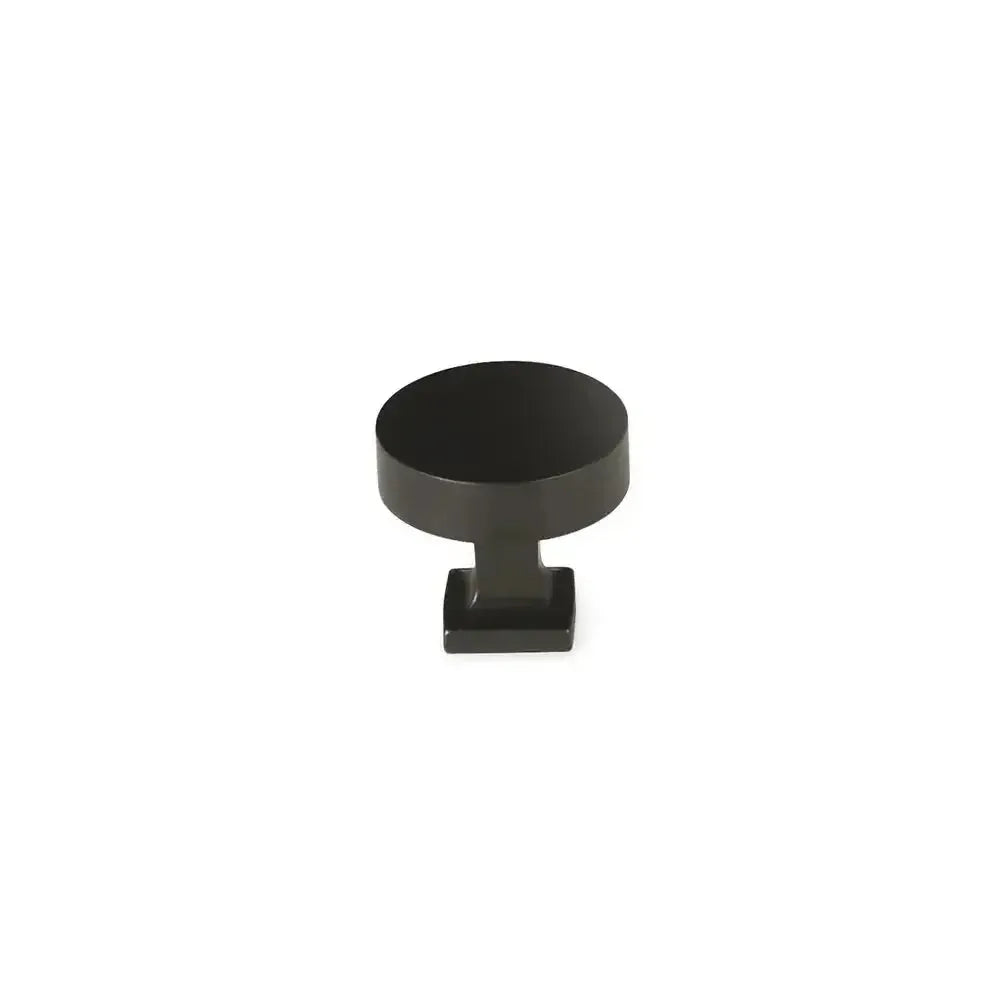 The Schaub Haniburton Round Cabinet Knob with Square Base in Matte Black finish.