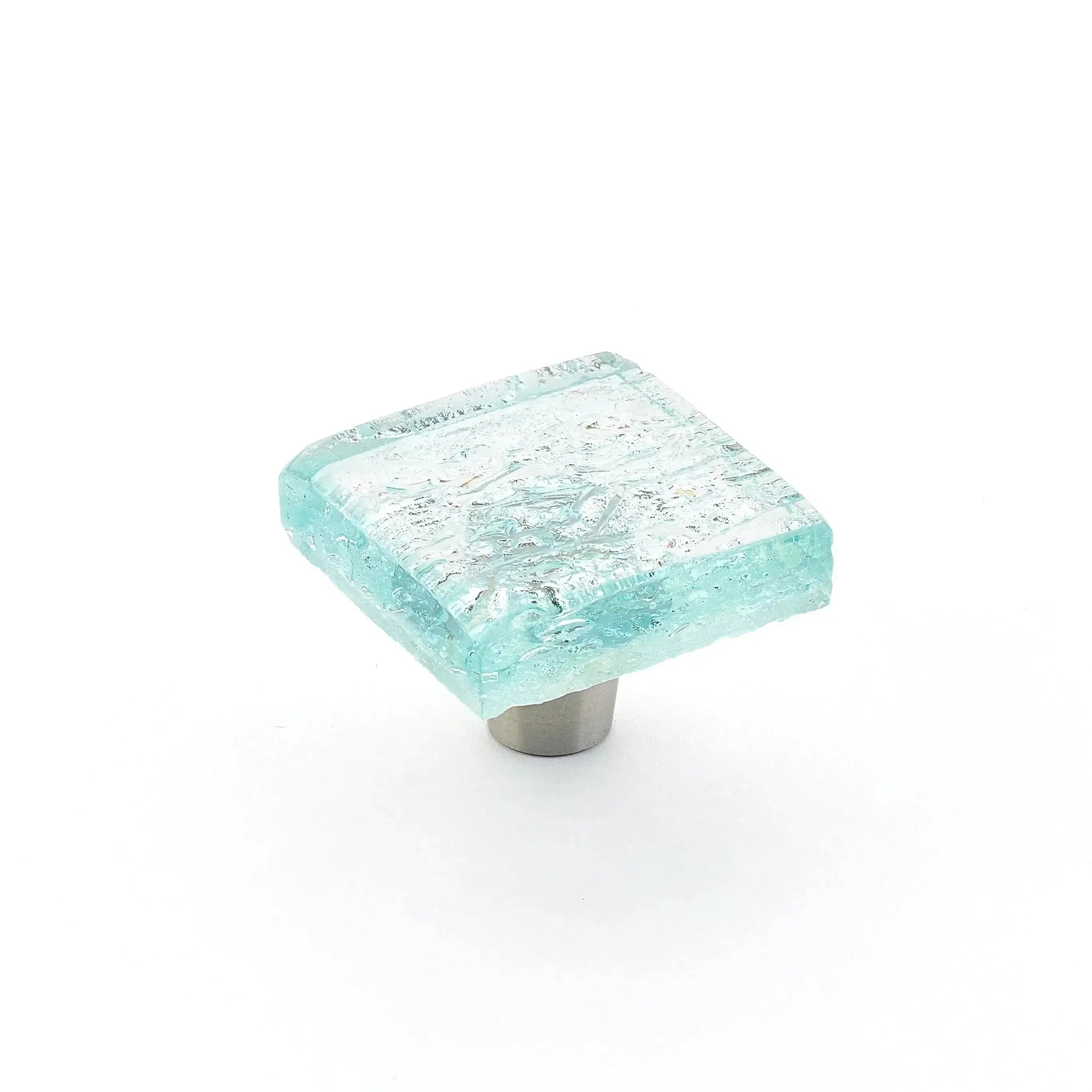 The Schaub Ice Pearl Square Cabinet Knob in Pearl Aqua finish.
