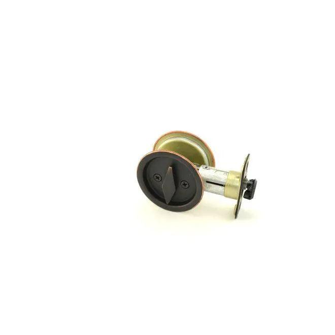 Kwikset Round Privacy Pocket Door Lock in Venetian Bronze finish