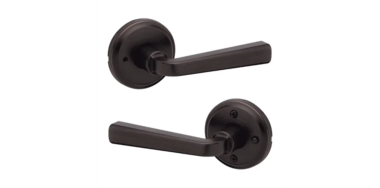 Kwikset Trafford Privacy Lever in Venetian Bronze finish