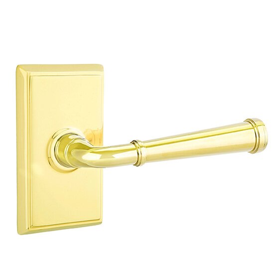 The Emtek Merrimack Lever With Rectangular Rosette in Lifetime Polished Brass finish