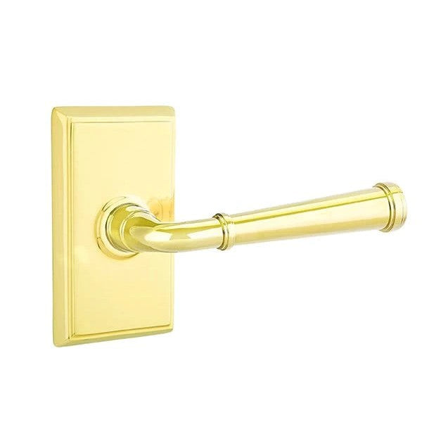 The Emtek Merrimack Lever With Rectangular Rosette in Lifetime Polished Brass finish