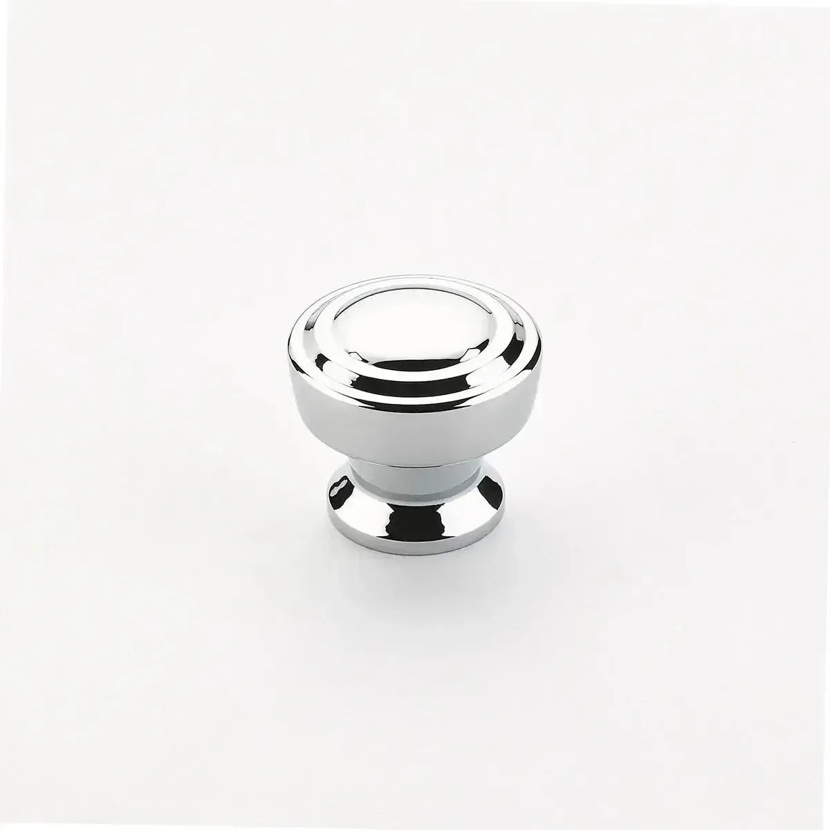 The Schaub Menlo Park Stepped Round Cabinet Knob in Polished Chrome finish.