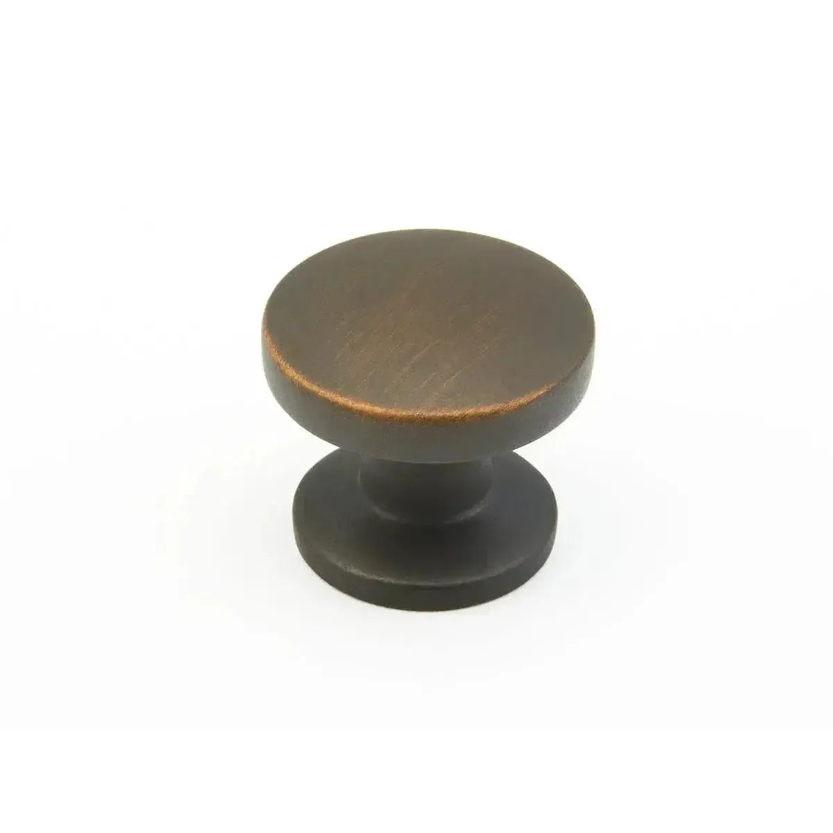 The Schaub Northport Smooth Round Cabinet Knob in Ancient Bronze finish.