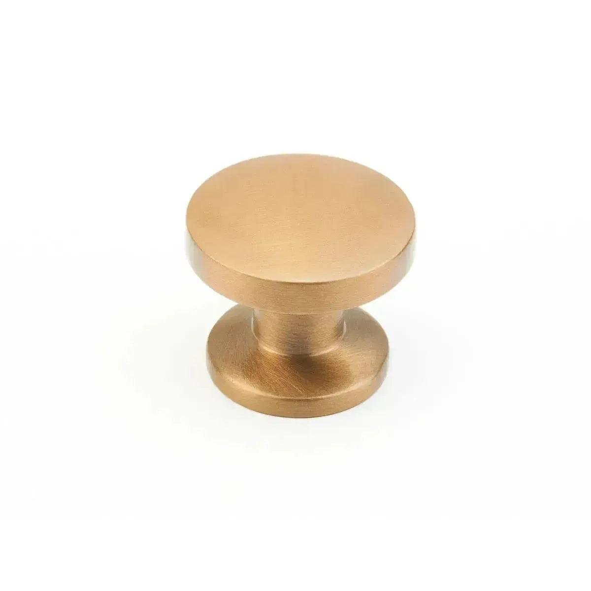 The Schaub Northport Smooth Round Cabinet Knob in Brushed Bronze finish.