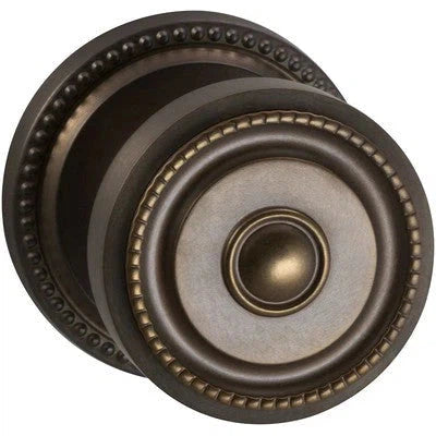 The Omnia Traditions Beaded 430 Knob with Round Beaded Rosette in Antique Bronze, Unlacquered finish