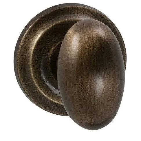 Omnia Traditions 432 Egg-Shaped Knob with Round Rosette in Shaded Bronze finish