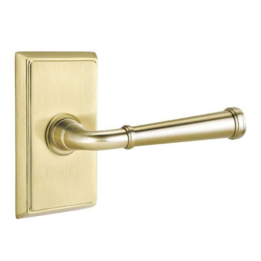 The Emtek Merrimack Lever With Rectangular Rosette in Satin Brass finish