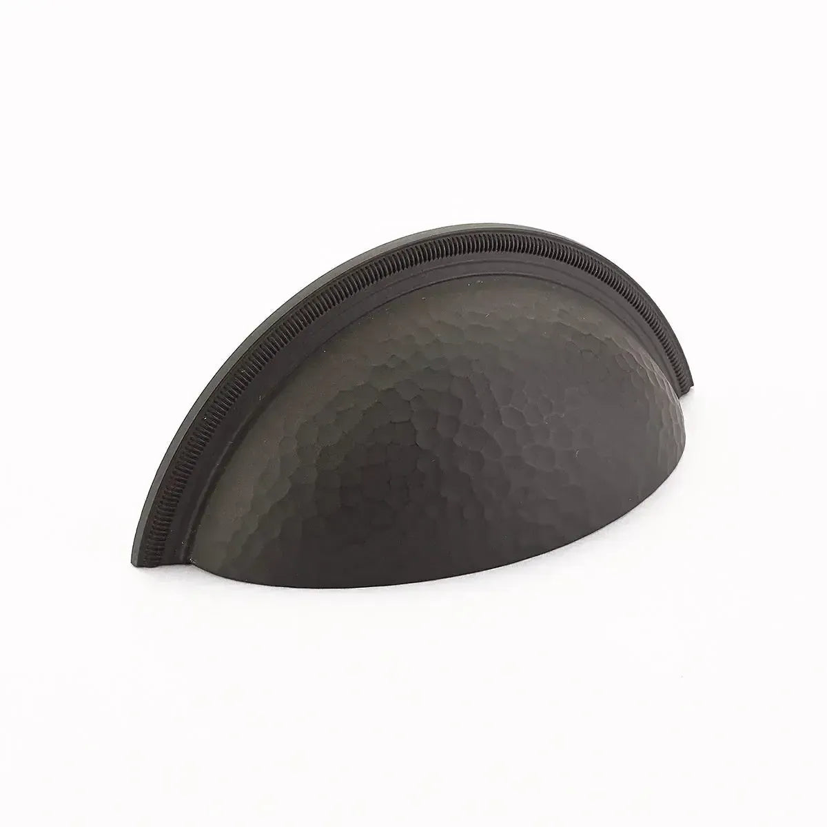 The Schaub Atherton Hammered Knurled Edge Cup Pull in Oil Rubbed Bronze finish.