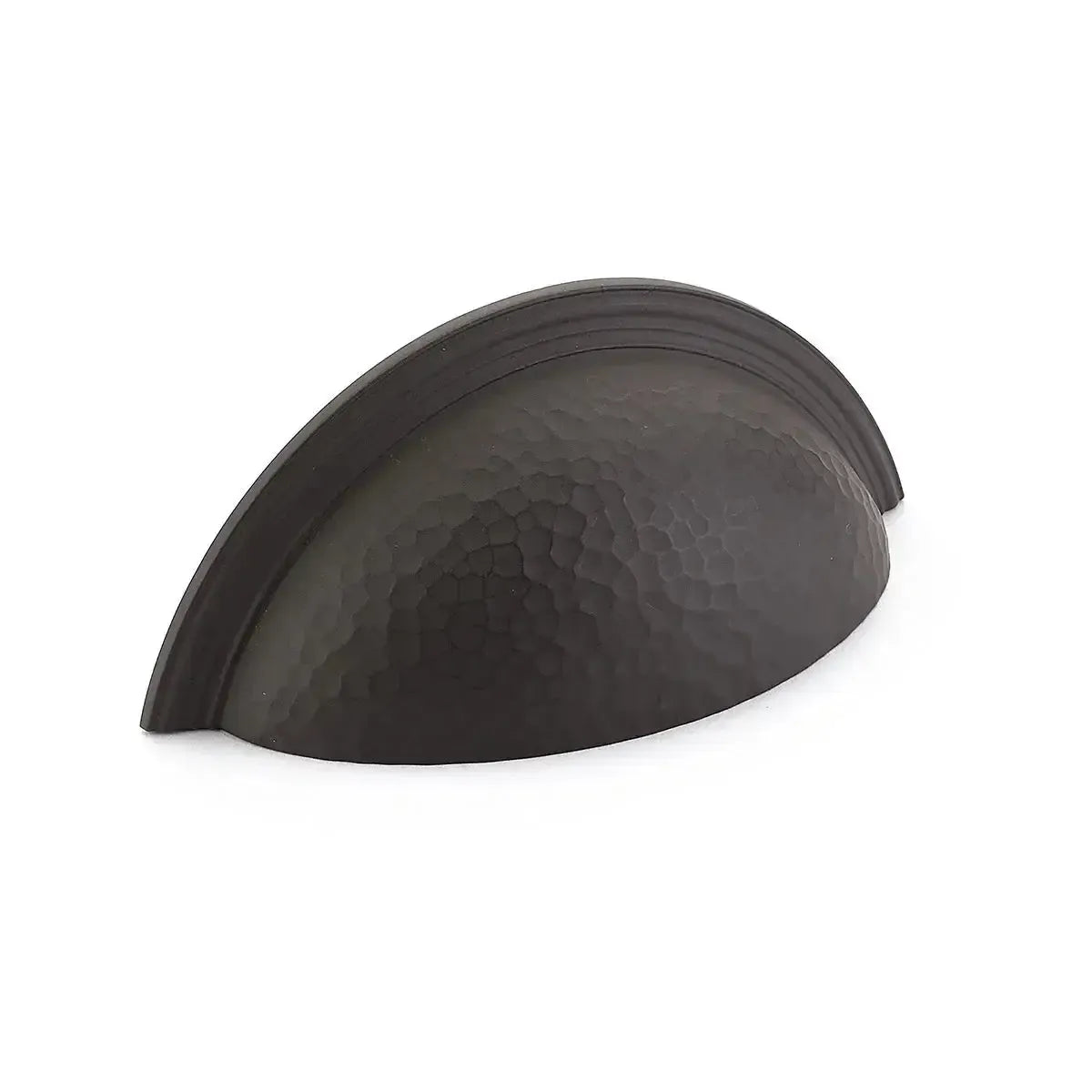 The Schaub Atherton Hammered Plain Edge Cup Pull in Oil Rubbed Bronze finish.