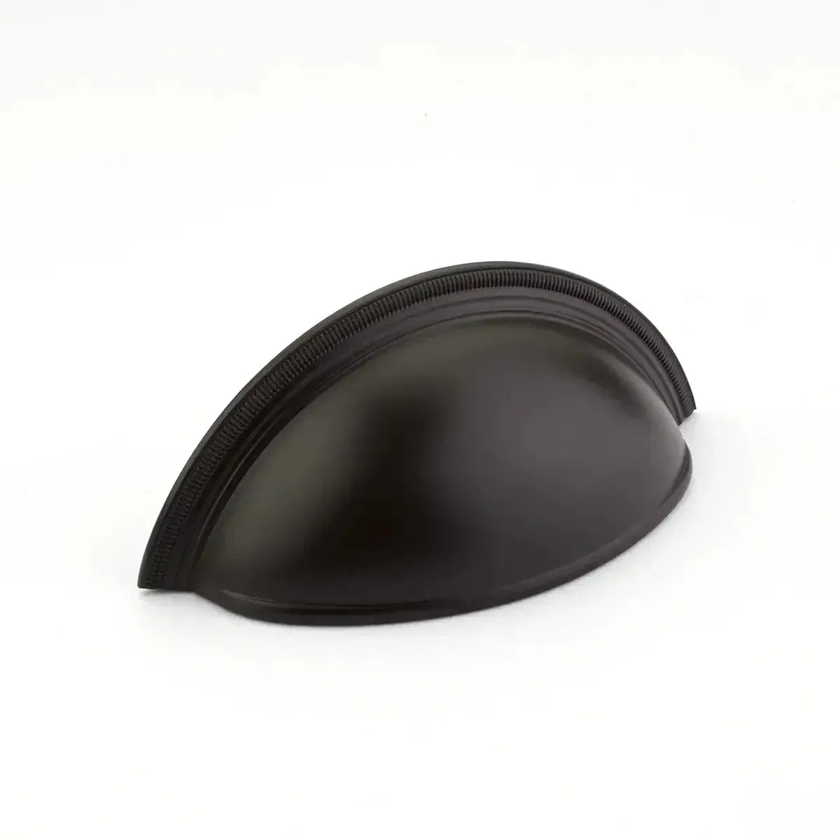 The Schaub Atherton Plain Surface Knurled Edge Cup Pull in Oil Rubbed Bronze finish.