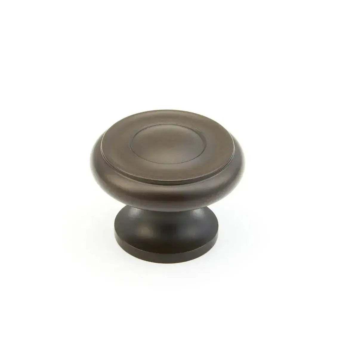 The Schaub Traditional Stepped Round Cabinet Knob in Oil Rubbed Bronze finish.