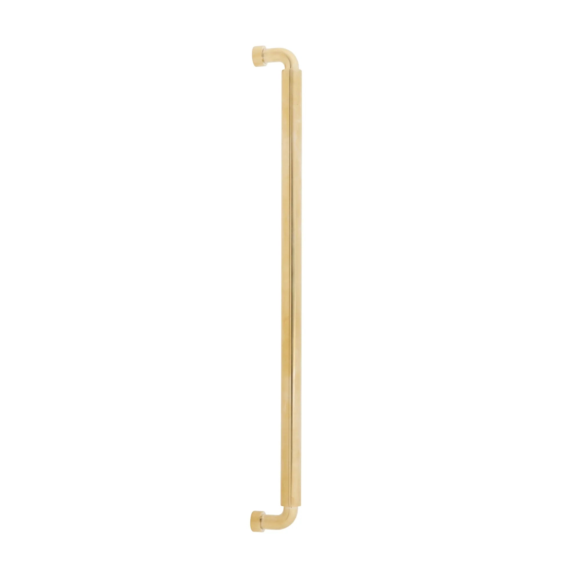The Schaub NOHO Round Appliance Pull in Unlacquered Brass finish.