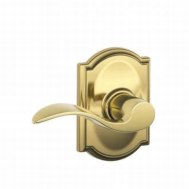 Schlage Accent Passage Lever With Camelot Rosette in Bright Brass finish