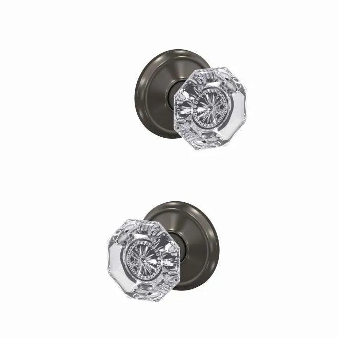 The Schlage Custom Alexandria Passage and Privacy Glass Knob With Alden Rosette in Black Stainless finish