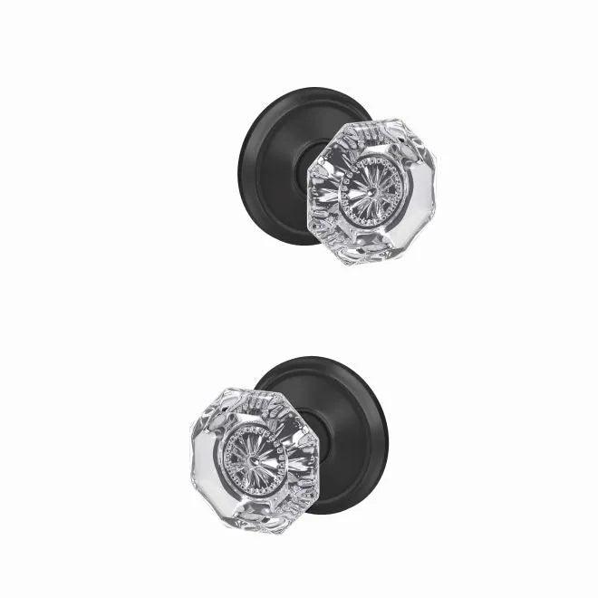 The Schlage Custom Alexandria Passage and Privacy Glass Knob With Alden Rosette in Flat Black finish