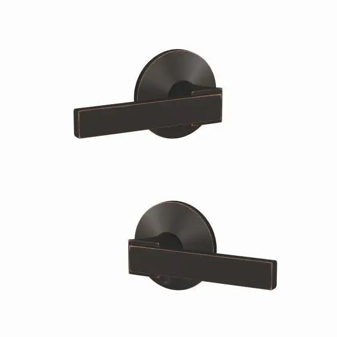 Schlage Custom Northbrook Lever with Kinsler Rosette in Aged Bronze finish