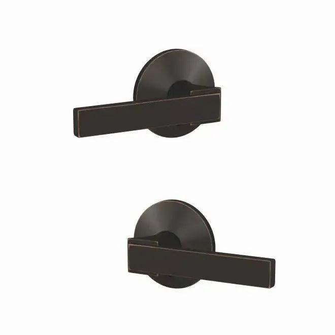 Schlage Custom Northbrook Lever with Kinsler Rosette in Aged Bronze finish