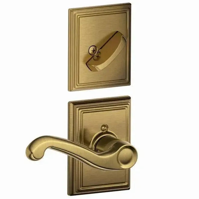 Schlage Flair Lever with Addison Rosette Interior Active Trim in Antique Brass finish