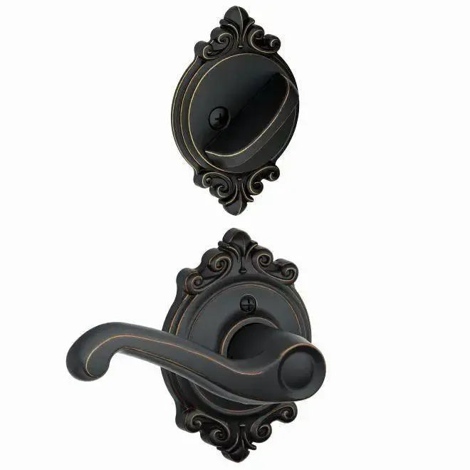 Schlage Flair Lever with Brookshire Rosette Interior Active Trim in Aged Bronze finish