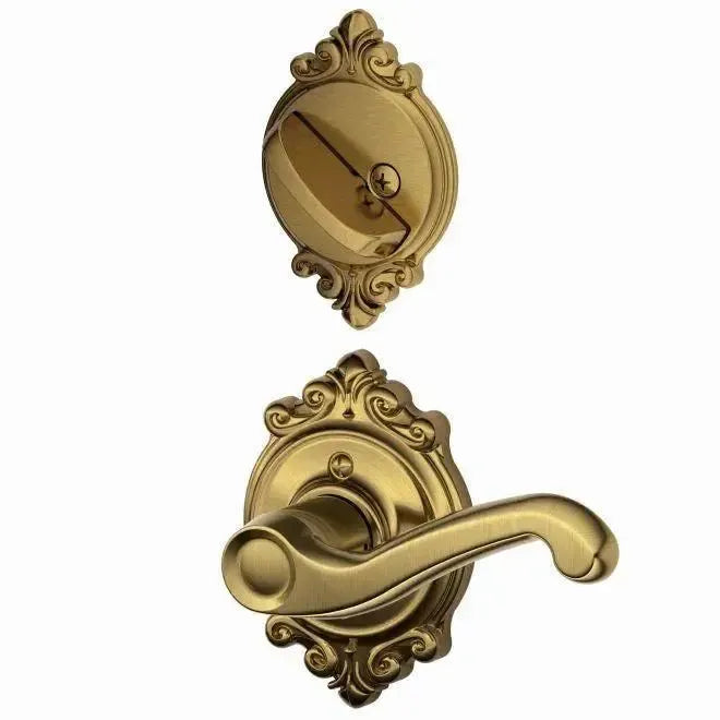 Schlage Flair Lever with Brookshire Rosette Interior Active Trim in Antique Brass finish