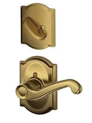 Schlage Flair Lever with Camelot Rosette Interior Active Trim in Antique Brass finish