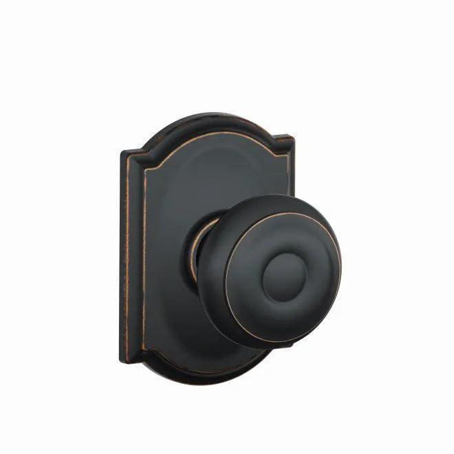 Schlage Georgian Passage Knob With Camelot Rosette Aged Bronze