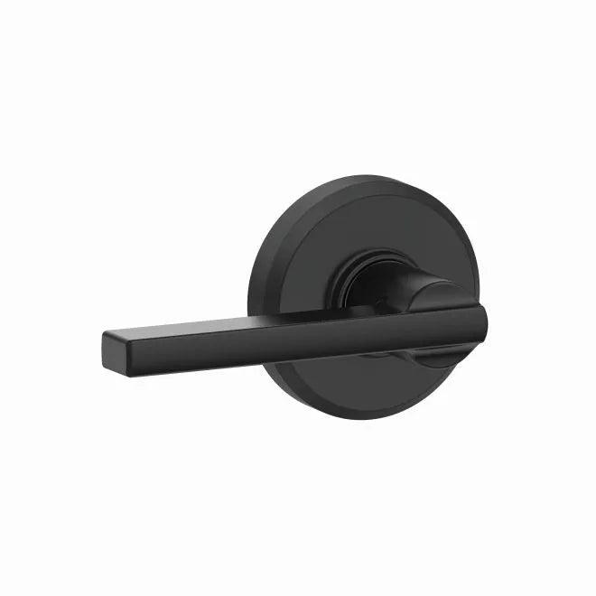 The Schlage Latitude Passage Lever With Greyson Rosette in Flat Black finish