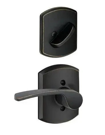 Schlage Merano Lever with Greenwich Rosette Interior Active Trim in Aged Bronze finish