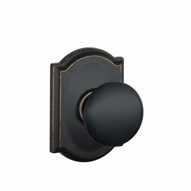 Schlage Plymouth Passage Knob With Camelot Rosette Aged Bronze