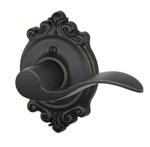 Schlage Accent Lever with Brookshire Rosette in Aged Bronze finish
