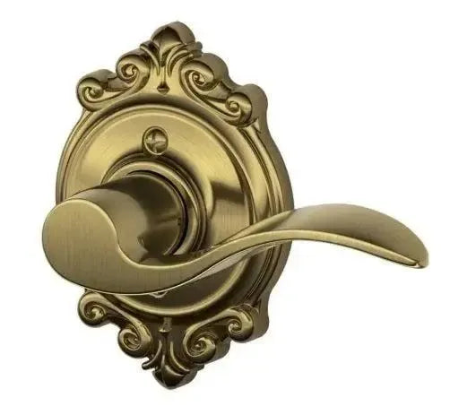 Schlage Accent Lever with Brookshire Rosette in Antique Brass finish