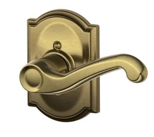 Schlage Right Hand Flair Lever With Camelot Rosette Half Dummy Antique Brass
