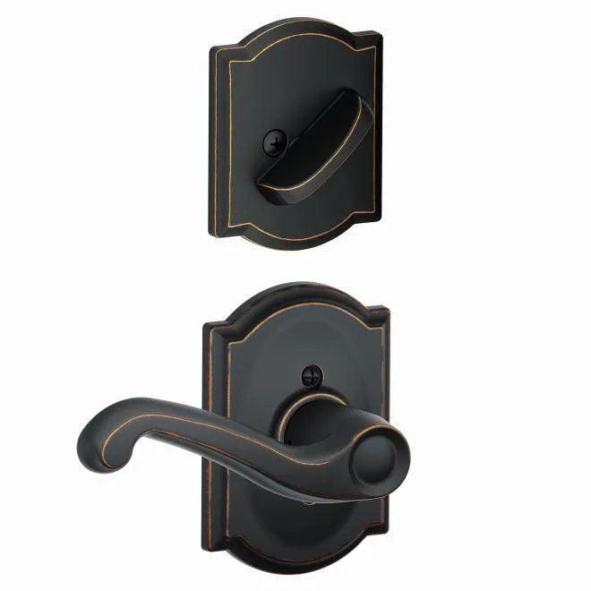 The Schlage Right Hand Flair Lever With Camelot Rosette Interior Active Trim - Exterior Handleset Sold Separately in Aged Bronze finish