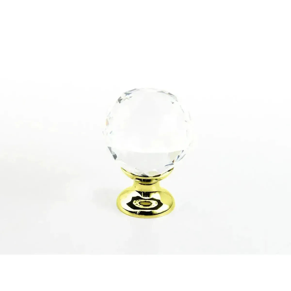 The Schaub Stargaze Round Glass Cabinet Knob in Polished Brass finish.